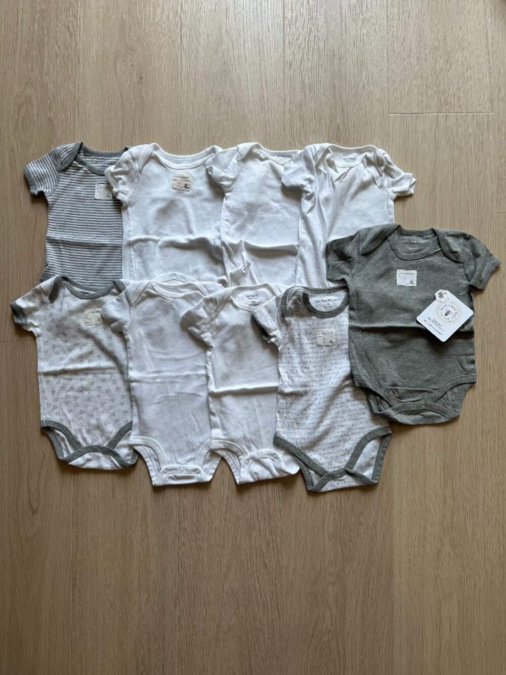 9 Piece Set of Baby Onesies 12M
